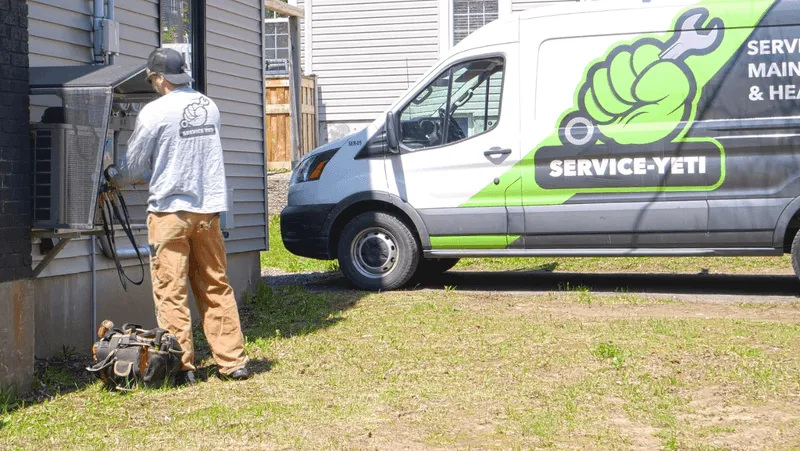 Greenfoot technician working on HVAC equipment